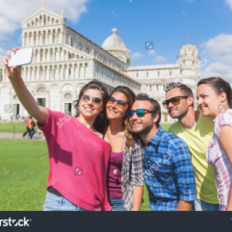 stock-photo-group-of-tourists-or-friends-taking-a-selfie-in-pisa-italy-with-famous-leaning-tower-on-292155440
